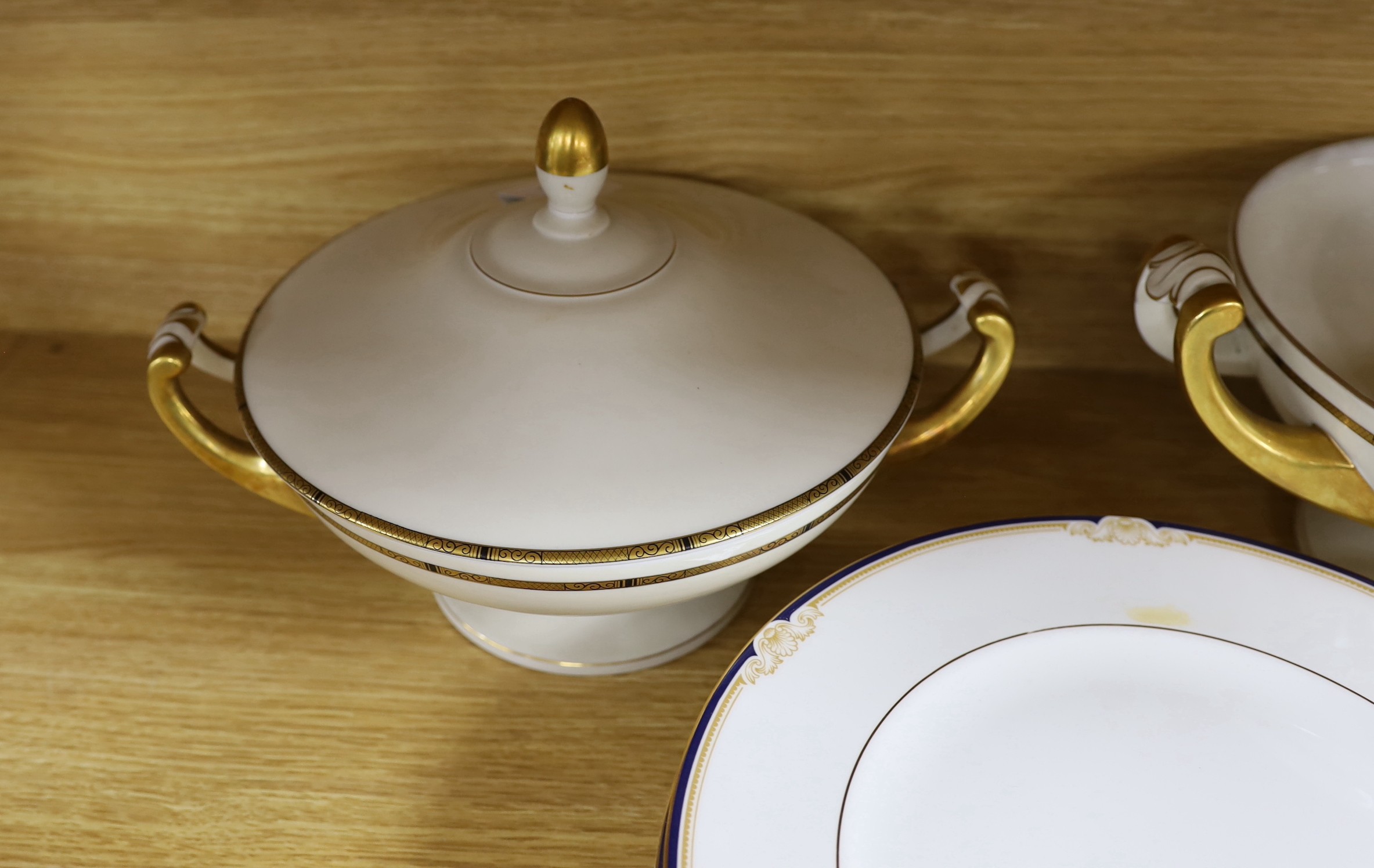 Ten Wedgwood Cavendish dinner plates and two Bavarian porcelain tureens